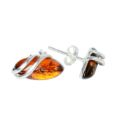 Darcie Baltic honey amber stud earrings in 925 sterling silver shown in side view with post and butterfly backs, genuine Polish handmade amber jewelry on white background.