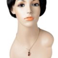 Model wearing sterling silver Baltic honey amber cat pendant necklace on 18 inch chain, genuine amber lucky kitty charm displayed on mannequin bust