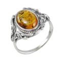 Sterling silver ring with oval Baltic honey amber stone in an ornate vintage-style setting