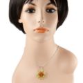 Woman mannequin wearing a multicolor Baltic amber flower pendant necklace in 925 sterling silver with honey, green, and golden amber on an 18 inch chain.