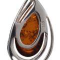 Close-up of Micaela genuine Baltic honey amber teardrop pendant in 925 sterling silver showing natural inclusions and polished open-frame setting