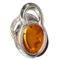 Close-up of genuine Baltic honey amber pendant set in 925 sterling silver, Beaming Sun handmade Polish amber jewelry showing natural inclusions and 925 stamp