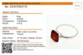 Amber Experts micro report certificate for a ring, showing report number 220207003115, object details, identification as treated Baltic amber (succinite), weight 2.35 g, date and place listed as 07.02.2022 in Gdańsk, Poland, expert name Michał Kosior, a QR code, and a product photo of a silver ring with a dark orange amber stone.