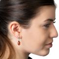 Image of natural amber earrings on model