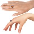 Image of GIA Certified Sterling Silver and Baltic Honey Amber jewelry with silver setting Image of GIA Certified Sterling Silver and Baltic Honey Amber on model's hand