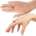 Sterling silver Baltic honey amber ring worn on hand, featuring a natural amber gemstone in a polished 925 silver setting, handcrafted women’s amber jewelry
