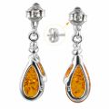Back view of genuine Baltic honey amber teardrop drop earrings in 925 sterling silver, showing butterfly stud backs and visible 925 hallmark on polished silver setting