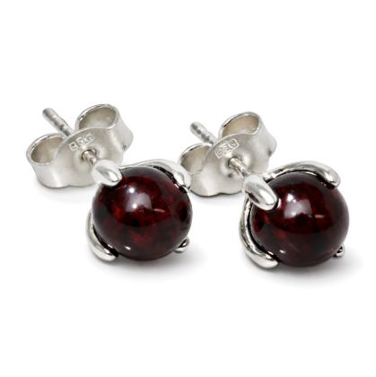 Sadie genuine Baltic honey amber stud earrings in 925 sterling silver with petal-style prong setting and post back closure, handmade Polish amber jewelry for women on white background