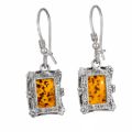 Genuine Baltic honey amber rectangular drop earrings in 925 sterling silver with French hook ear wires, natural amber inclusions visible
