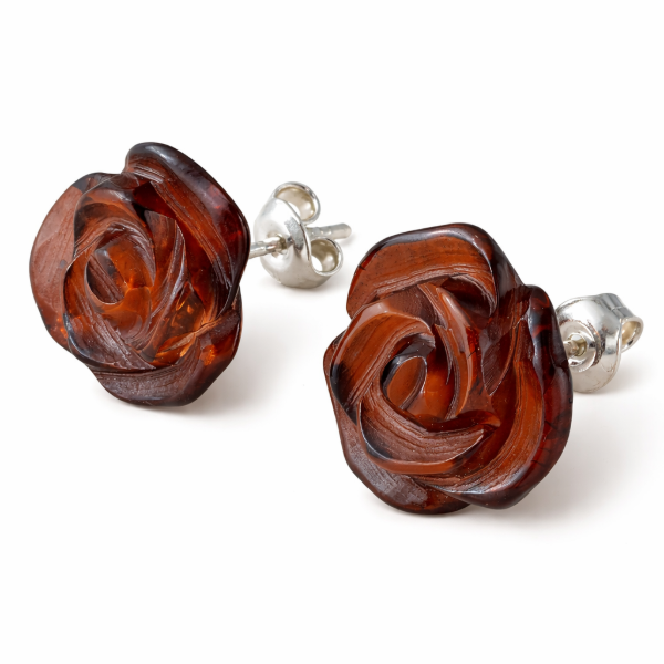 Cherry Baltic amber rose stud earrings in 925 sterling silver, featuring hand-carved floral design and rich cognac-red natural amber.