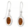 Back view of sterling silver dangle earrings with oval cognac amber stones, polished French wire hooks, silver bead accents, and 925 stamps.