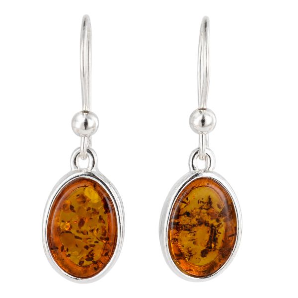 Sterling silver dangle earrings with oval cognac amber stones, French wire hooks, polished silver bead accents, and a classic open-frame setting.