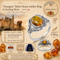 Georgine Baltic honey amber ring crafted in 925 sterling silver, featuring an oval honey-colored Baltic amber gemstone in an ornate vintage-style setting. The infographic highlights the ring's origin in Gdańsk, Poland, known as the heart of the amber industry, and includes details about genuine Baltic amber aged 40–50 million years, sterling silver certification, authenticity certificate, gift packaging, and a weight of 2.96 grams. The design is presented against a warm vintage-inspired background with images of Gdańsk architecture and polished amber stones.