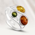 “Magdalena” Baltic Amber Adjustable Ring in Sterling Silver with multicolor amber gemstones.