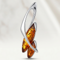 London Baltic Honey Amber Pendant in Sterling Silver featuring genuine honey amber gemstones set in a modern flowing sterling silver design.