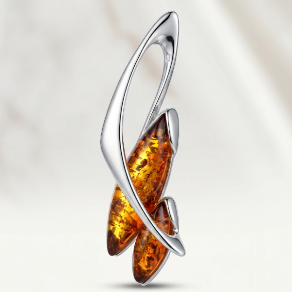 London Baltic Honey Amber Pendant in Sterling Silver featuring genuine honey amber gemstones set in a modern flowing sterling silver design.