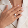 Gabriela Baltic Amber Ring in Sterling Silver worn on a woman's finger, showcasing three polished honey amber stones in an elegant sterling silver setting.