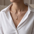 Isabella Baltic Amber Pendant in Sterling Silver worn on a delicate silver chain, featuring a genuine Baltic amber gemstone in an elegant sterling silver setting.