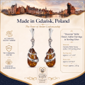 Zuzanna Baltic Honey Amber Earrings in Sterling Silver infographic highlighting authentic honey Baltic amber, 925 sterling silver, handcrafted craftsmanship, earring dimensions, and Made in Gdańsk, Poland heritage.