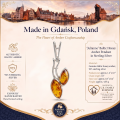 Julianne Baltic Honey Amber Pendant in Sterling Silver infographic highlighting authentic honey Baltic amber, 925 sterling silver, handcrafted craftsmanship, pendant dimensions, and Made in Gdańsk, Poland heritage.