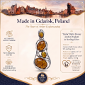 Taylor Baltic Honey Amber Pendant in Sterling Silver infographic highlighting authentic honey Baltic amber, 925 sterling silver, handcrafted craftsmanship, pendant dimensions, and Made in Gdańsk, Poland heritage.