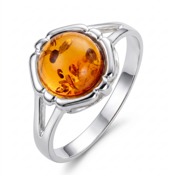 Clara Baltic Honey Amber Ring in Sterling Silver featuring a genuine honey Baltic amber gemstone set in polished 925 sterling silver, isolated on a white background.