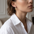 Woman wearing the Autumn Multicolor Baltic Amber Earrings in Sterling Silver, showcasing genuine multicolor Baltic amber and polished 925 sterling silver in an elegant luxury jewelry lifestyle setting.