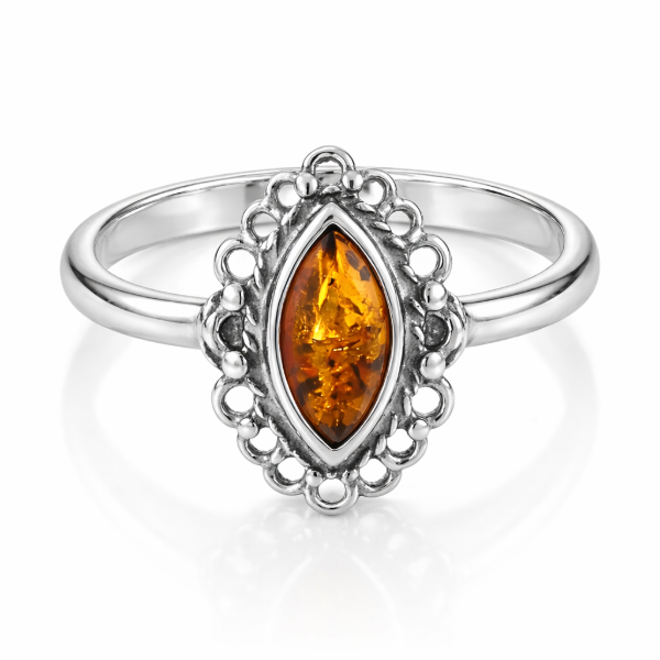Joan Baltic Honey Amber Ring in Sterling Silver featuring a genuine honey Baltic amber gemstone set in polished 925 sterling silver, isolated on a white background.