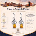 Theresa Baltic Honey Amber Earrings in Sterling Silver infographic highlighting authentic honey Baltic amber, 925 sterling silver, handcrafted craftsmanship, earring dimensions, and Made in Gdańsk, Poland heritage.