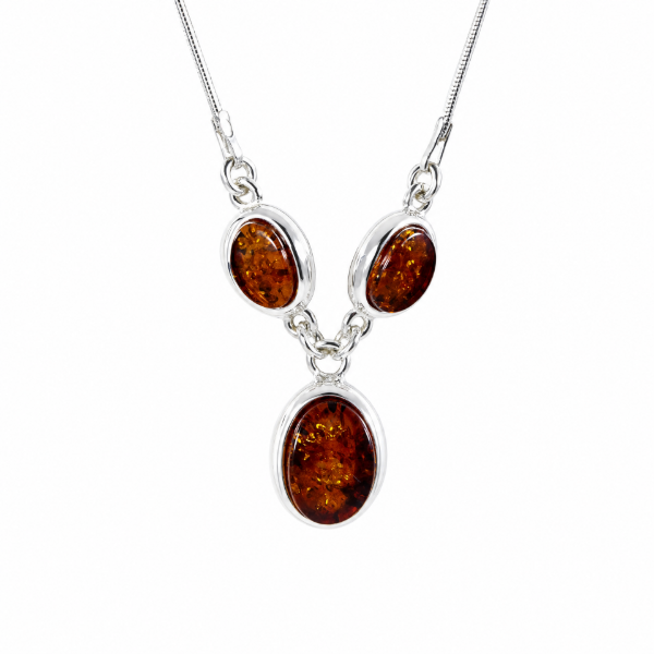 Milena Baltic Honey Amber Necklace in Sterling Silver featuring genuine honey Baltic amber gemstones set in polished 925 sterling silver, isolated on a white background.