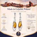 Milena Baltic Honey Amber Earrings in Sterling Silver infographic highlighting authentic honey Baltic amber, 925 sterling silver, handcrafted craftsmanship, earring dimensions, and Made in Gdańsk, Poland heritage.