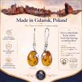 Milena Baltic Honey Amber Earrings in Sterling Silver infographic highlighting authentic honey Baltic amber, 925 sterling silver, handcrafted craftsmanship, earring dimensions, and Made in Gdańsk, Poland heritage.