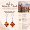Simone Baltic Honey Amber Earrings in Sterling Silver infographic highlighting authentic honey Baltic amber, 925 sterling silver, handcrafted craftsmanship, earring dimensions, and Made in Gdańsk, Poland heritage.