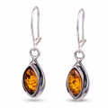 Penelope Baltic Honey Amber Earrings in Sterling Silver featuring genuine honey Baltic amber gemstones set in polished 925 sterling silver, isolated on a white background.