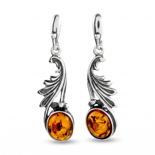 Thea Baltic Honey Amber Earrings in Sterling Silver featuring genuine honey Baltic amber gemstones set in polished 925 sterling silver, isolated on a white background.