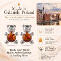 Teddy Bear Baltic Honey Amber Earrings in Sterling Silver infographic highlighting authentic honey Baltic amber, 925 sterling silver, handcrafted craftsmanship, teddy bear earring dimensions, and Made in Gdańsk, Poland heritage.