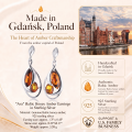 Ava Baltic Honey Amber Earrings in Sterling Silver infographic highlighting authentic honey Baltic amber, 925 sterling silver, handcrafted craftsmanship, earring dimensions, and Made in Gdańsk, Poland heritage.