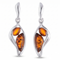 Stella Baltic Honey Amber Earrings in Sterling Silver featuring genuine honey Baltic amber gemstones set in polished 925 sterling silver, isolated on a white background.