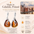 Yvonne Baltic Honey Amber Earrings in Sterling Silver infographic highlighting authentic honey Baltic amber, 925 sterling silver, handcrafted craftsmanship, earring dimensions, and Made in Gdańsk, Poland heritage.