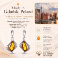Amy Baltic Honey Amber Earrings in Sterling Silver infographic highlighting authentic honey Baltic amber, 925 sterling silver, handcrafted craftsmanship, earring dimensions, and Made in Gdańsk, Poland heritage.