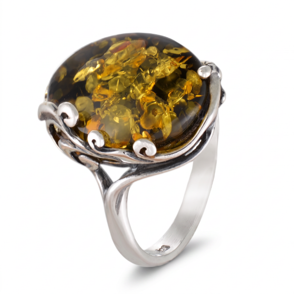 Dana Baltic Green Amber Ring in Sterling Silver featuring a genuine green Baltic amber gemstone set in polished 925 sterling silver, isolated on a white background.