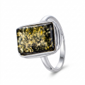 Cora Baltic Green Amber Ring in Sterling Silver featuring a genuine green Baltic amber gemstone set in polished 925 sterling silver, isolated on a white background.