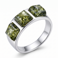 Mila Baltic Green Amber Ring in Sterling Silver featuring a genuine green Baltic amber gemstone set in polished 925 sterling silver, isolated on a white background.