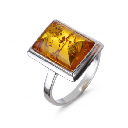 Baltic Honey Amber Rectangle Ring in Sterling Silver featuring a genuine rectangular honey Baltic amber gemstone set in polished 925 sterling silver, isolated on a white background.