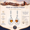 Lydia Baltic Honey Amber Earrings in Sterling Silver infographic highlighting authentic honey Baltic amber, 925 sterling silver, handcrafted craftsmanship, earring dimensions, and Made in Gdańsk, Poland heritage.