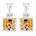 Florence Baltic Honey Amber Earrings in Sterling Silver featuring genuine honey Baltic amber gemstones set in polished 925 sterling silver, isolated on a white background.