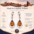 Julia Baltic Honey Amber Earrings in Sterling Silver infographic highlighting authentic honey Baltic amber, 925 sterling silver, handcrafted craftsmanship, earring dimensions, and Made in Gdańsk, Poland heritage.