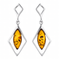 Rosalie Baltic Honey Amber Earrings in Sterling Silver featuring genuine honey Baltic amber gemstones set in polished 925 sterling silver, isolated on a white background.