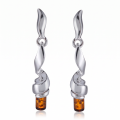 Eva Baltic Honey Amber Earrings in Sterling Silver featuring genuine honey Baltic amber gemstones set in polished 925 sterling silver, isolated on a white background.