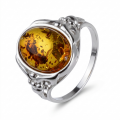 Maggie Baltic Honey Amber Oval Ring in Sterling Silver featuring a genuine oval honey Baltic amber gemstone set in polished 925 sterling silver, isolated on a white background.